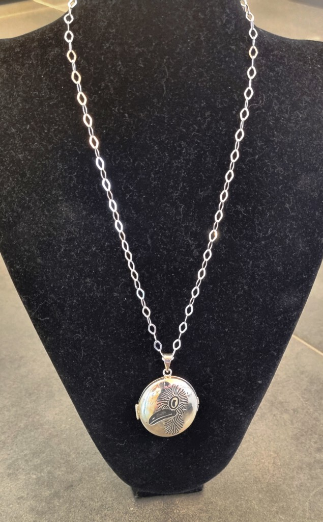 Silver version of the Manny Moa locket